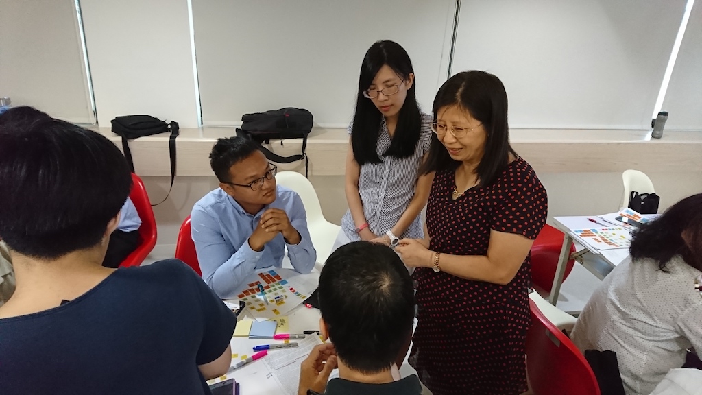 Corporate colleagues collaborate with the public